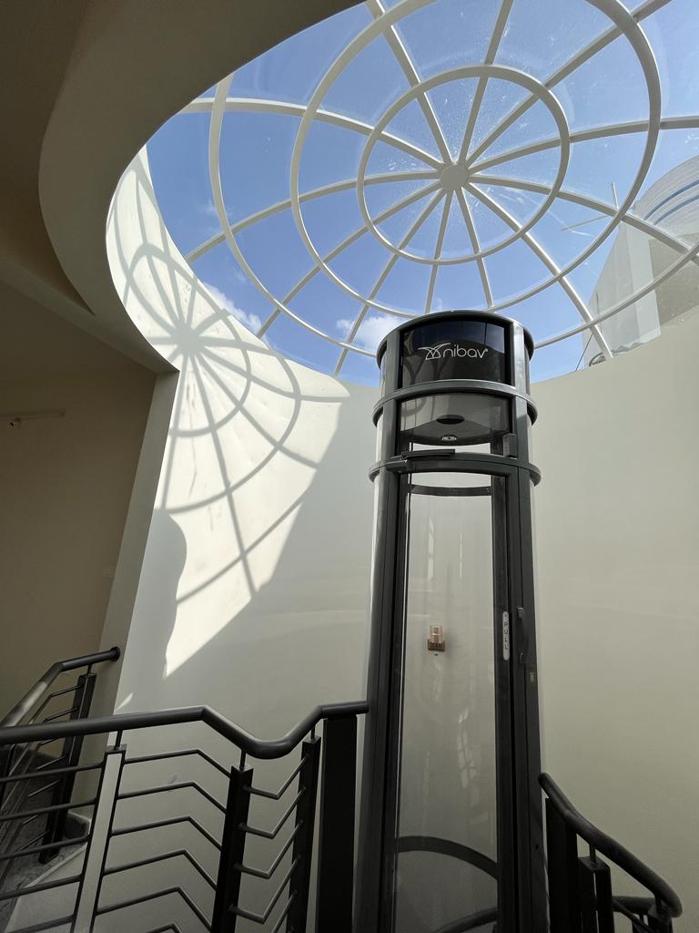Private lift beneath the skylight at Saptha Sagara Villa