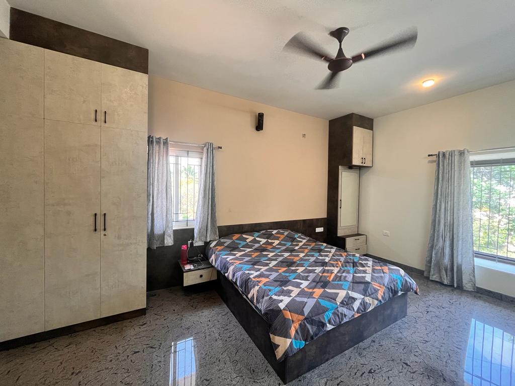 Bright bedroom at Saptha Sagara Villa